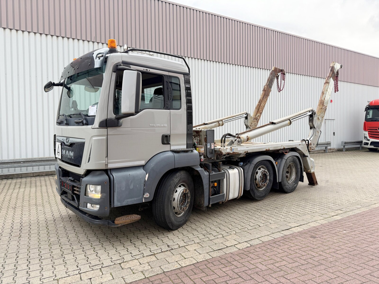 MAN TGS 26.420 6X2/4 BL TGS 26.420 6X2/4 BL, Intarder, Vorlauflenk-/lift, Tele-Absetzer, Funk - Скіповий навантажувач вантажівка: фото 1 MAN TGS 26.420 6X2/4 BL TGS 26.420 6X2/4 BL, Intarder, Vorlauflenk-/lift, Tele-Absetzer, Funk - Скіповий навантажувач вантажівка: фото 1