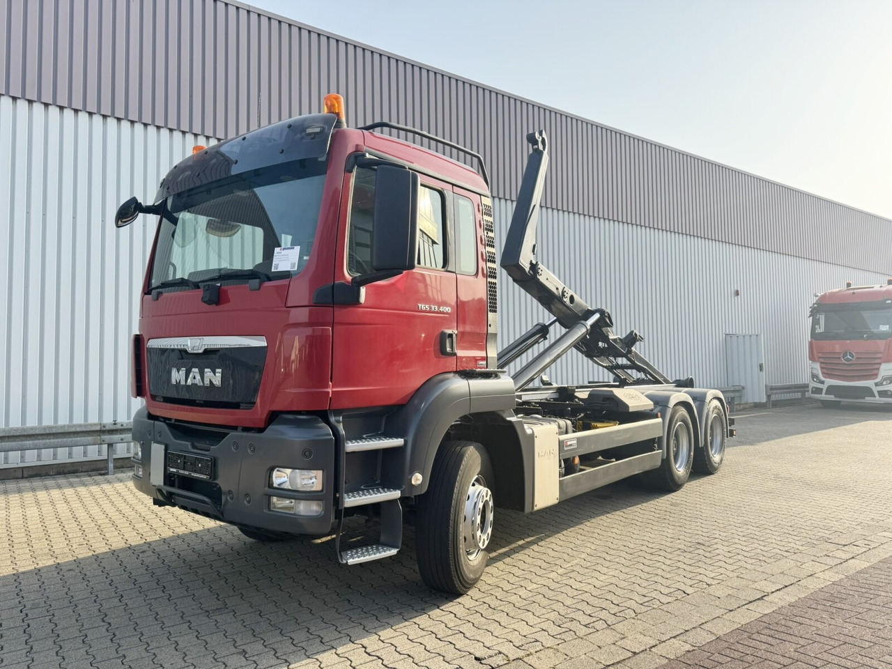 MAN TGS 33.400 6x4 BL TGS 33.400 6x4 BL, Navi - Гаковий мультиліфт вантажівка: фото 1 MAN TGS 33.400 6x4 BL TGS 33.400 6x4 BL, Navi - Гаковий мультиліфт вантажівка: фото 1