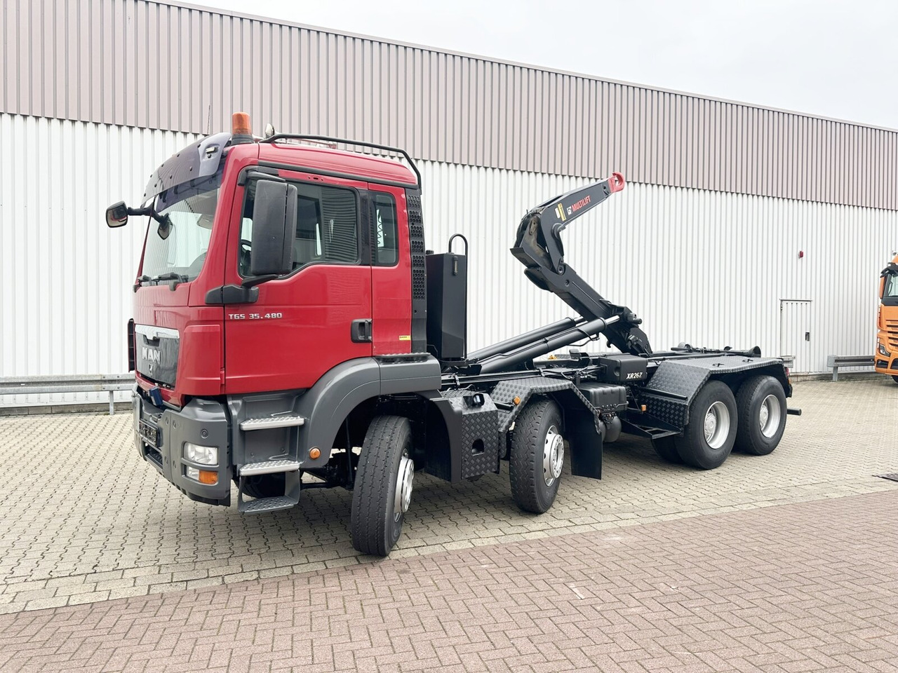 MAN TGS 35.480 8X4 BL TGS 35.400 8x4 BL, Schub-Knick bis 6,5m Container - Гаковий мультиліфт вантажівка: фото 1 MAN TGS 35.480 8X4 BL TGS 35.400 8x4 BL, Schub-Knick bis 6,5m Container - Гаковий мультиліфт вантажівка: фото 1