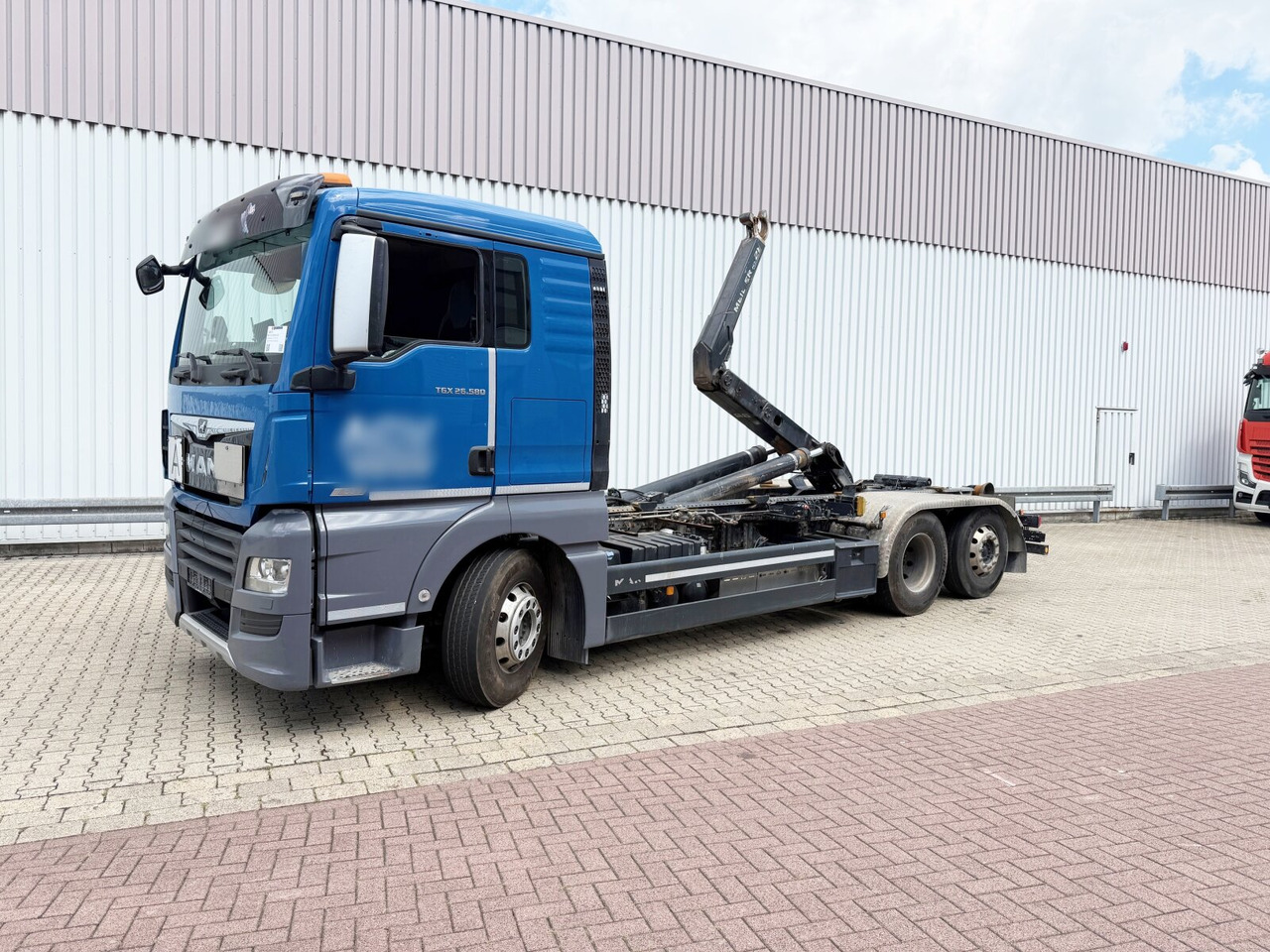 MAN TGX 26.580 6x2-4 BL TGX 26.580 6x2-4 BL, Intarder, Lenk-/Liftachse, Funk - Гаковий мультиліфт вантажівка: фото 1 MAN TGX 26.580 6x2-4 BL TGX 26.580 6x2-4 BL, Intarder, Lenk-/Liftachse, Funk - Гаковий мультиліфт вантажівка: фото 1