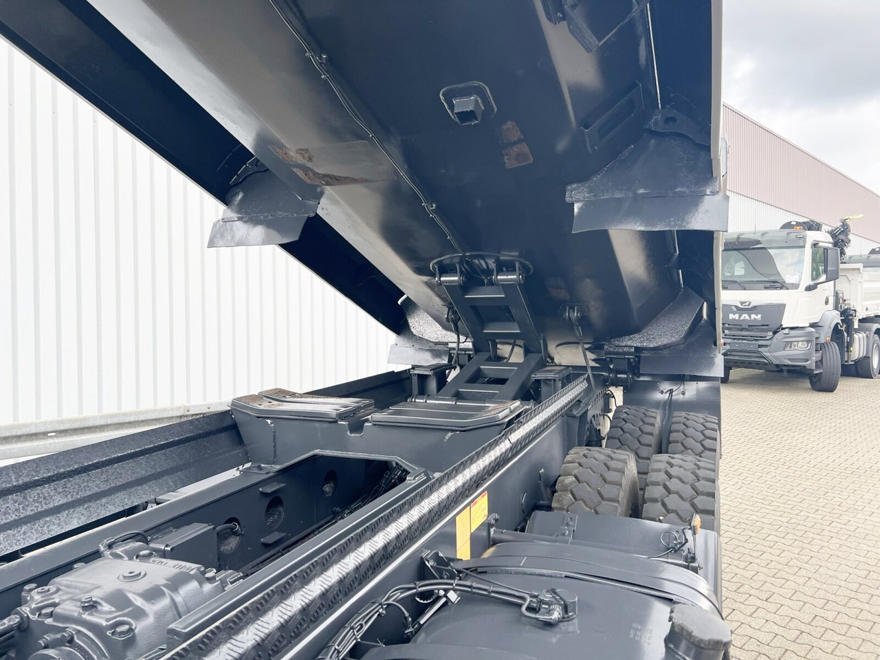 Самоскид Tatra Phoenix 8x8 Phoenix 8x8, Stahlmulde ca. 22m³, hydr. Heckklappe: фото 7 Самоскид Tatra Phoenix 8x8 Phoenix 8x8, Stahlmulde ca. 22m³, hydr. Heckklappe: фото 7