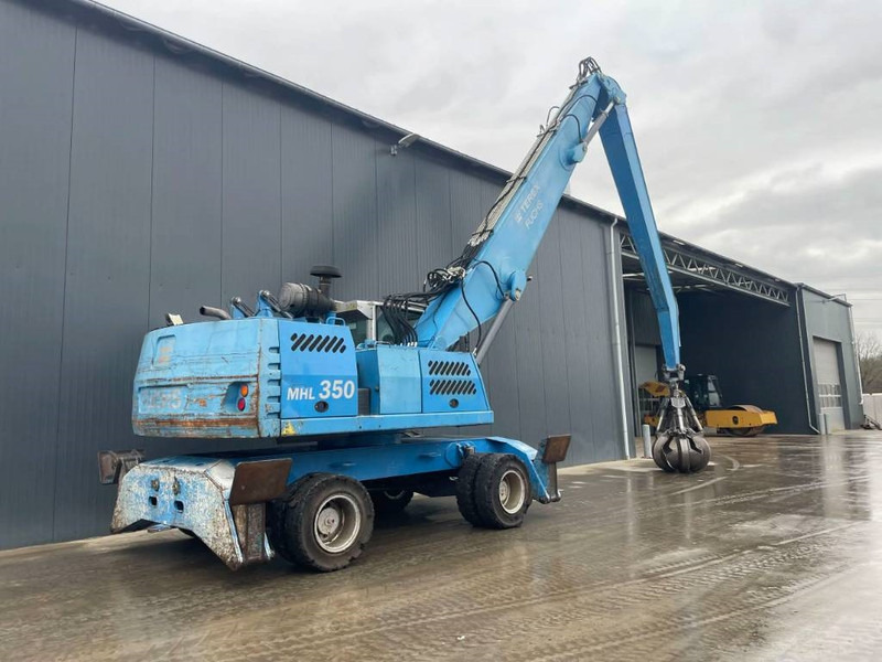 Fuchs MHL350 - Перевантажувач: фото 5 Fuchs MHL350 - Перевантажувач: фото 5