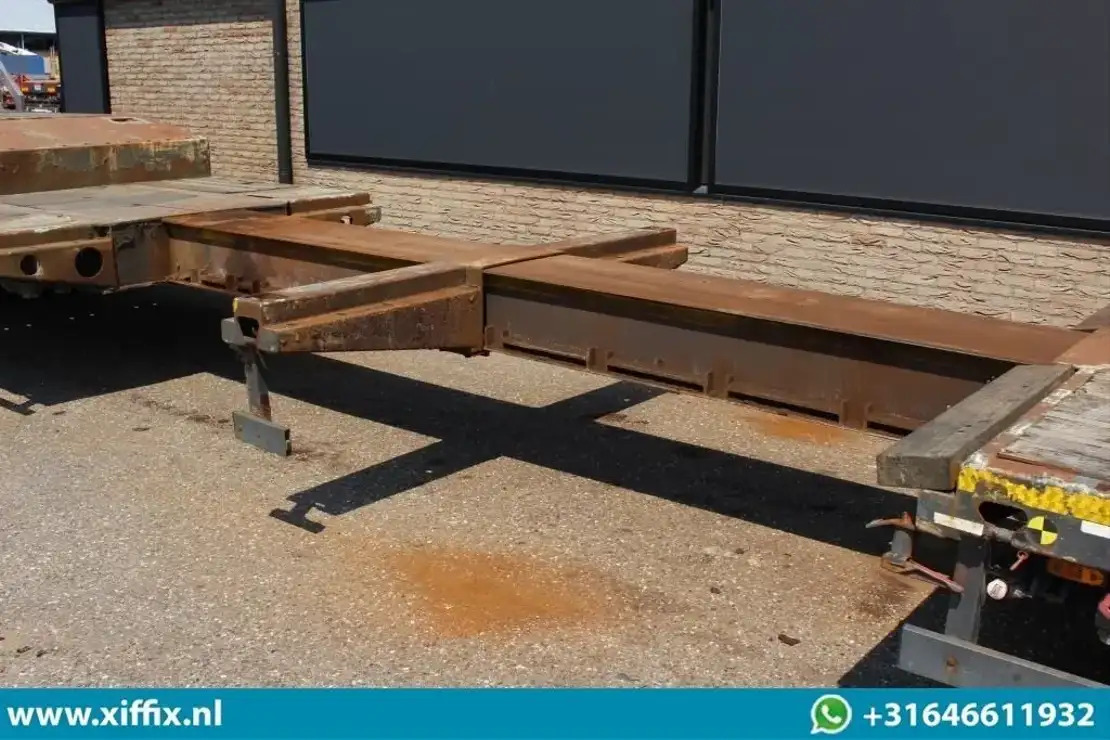 Meusburger 3-ass. Uitschuifbare semi dieplader met Alu. kleppen / Naloop gestuur - Низькорамна платформа напівпричіп: фото 5 Meusburger 3-ass. Uitschuifbare semi dieplader met Alu. kleppen / Naloop gestuur - Низькорамна платформа напівпричіп: фото 5
