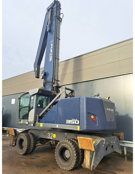 Fuchs MHL 350 F - Перевантажувач: фото 1 Fuchs MHL 350 F - Перевантажувач: фото 1