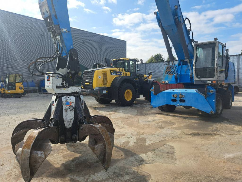 Fuchs MHL360D with low hour engine + grapple - Перевантажувач: фото 1 Fuchs MHL360D with low hour engine + grapple - Перевантажувач: фото 1