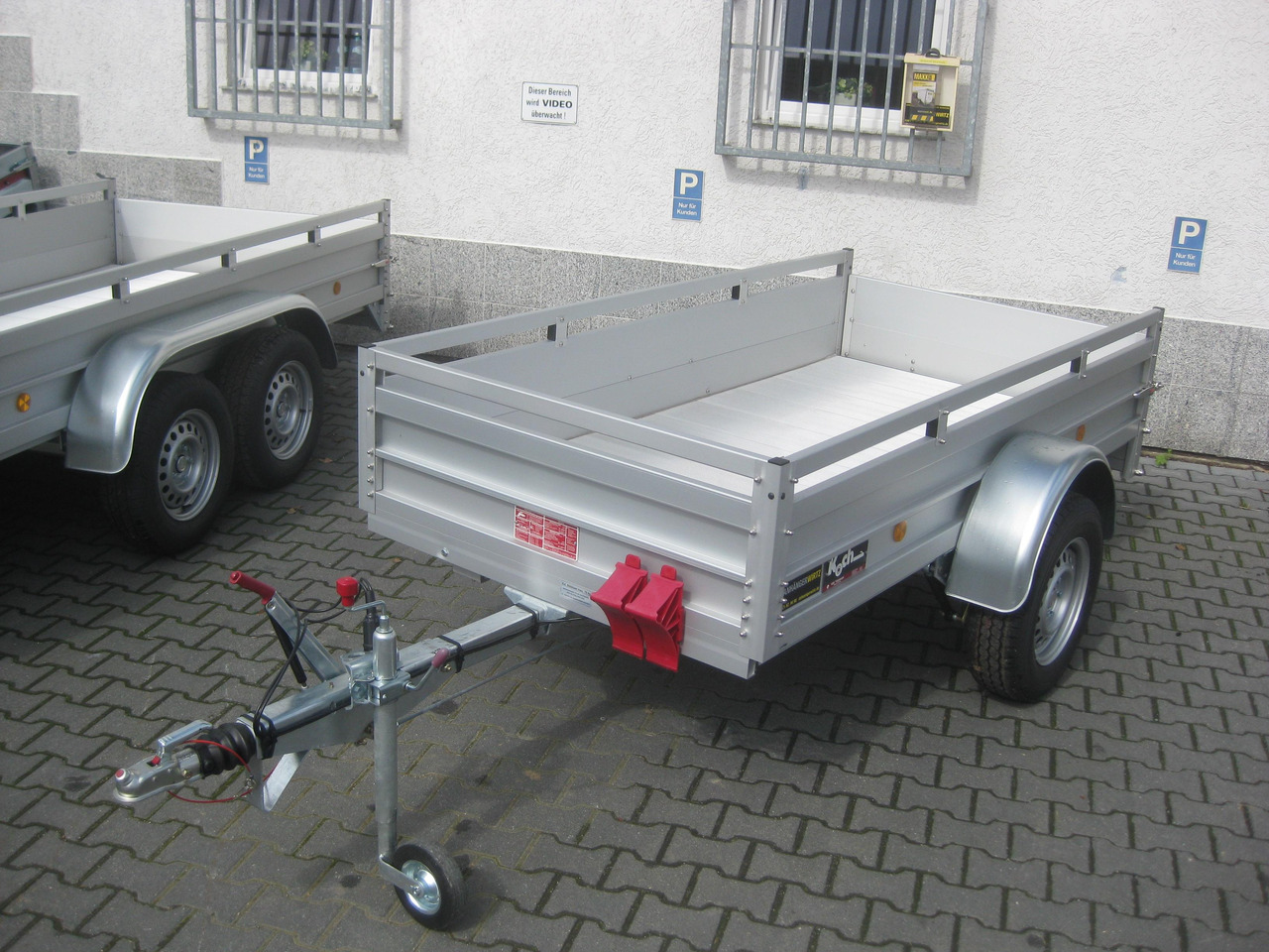 PKW Anhänger Koch Aluline+ 4.13 250x125x44cm ALUBODEN (S) 1300kg 100 km/H Online Abverkauf - Причеп для легкових автомобілів: фото 1 PKW Anhänger Koch Aluline+ 4.13 250x125x44cm ALUBODEN (S) 1300kg 100 km/H Online Abverkauf - Причеп для легкових автомобілів: фото 1