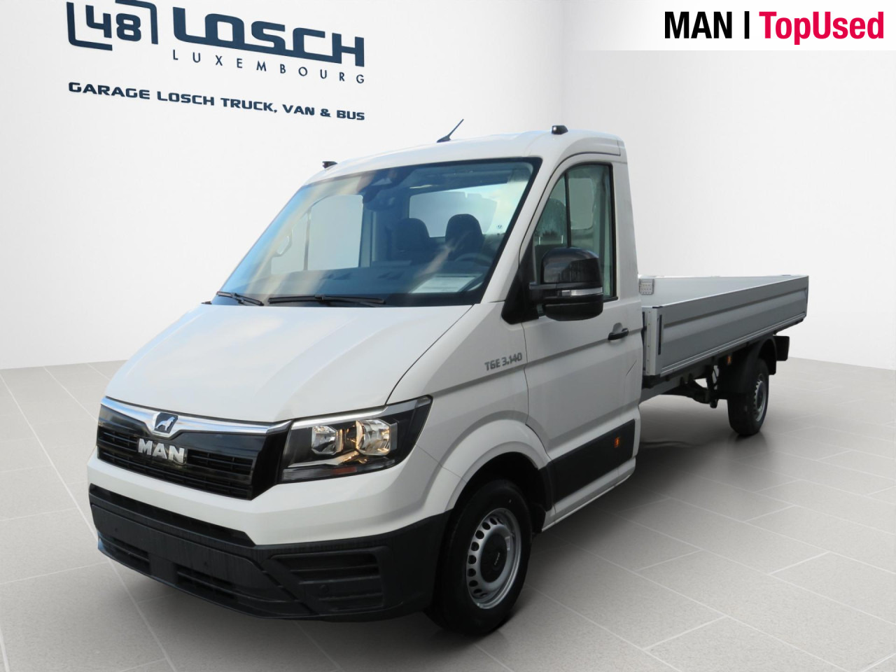 MAN TGE 3.140 4X2F L4 SB EK Pritsche - Легка бортова вантажівка: фото 1 MAN TGE 3.140 4X2F L4 SB EK Pritsche - Легка бортова вантажівка: фото 1