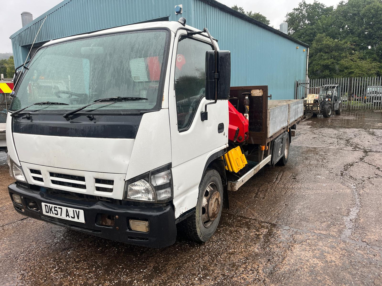 Isuzu NQR 70 - Бортова вантажівка/ Платформа, Вантажівка з маніпулятором: фото 1 Isuzu NQR 70 - Бортова вантажівка/ Платформа, Вантажівка з маніпулятором: фото 1