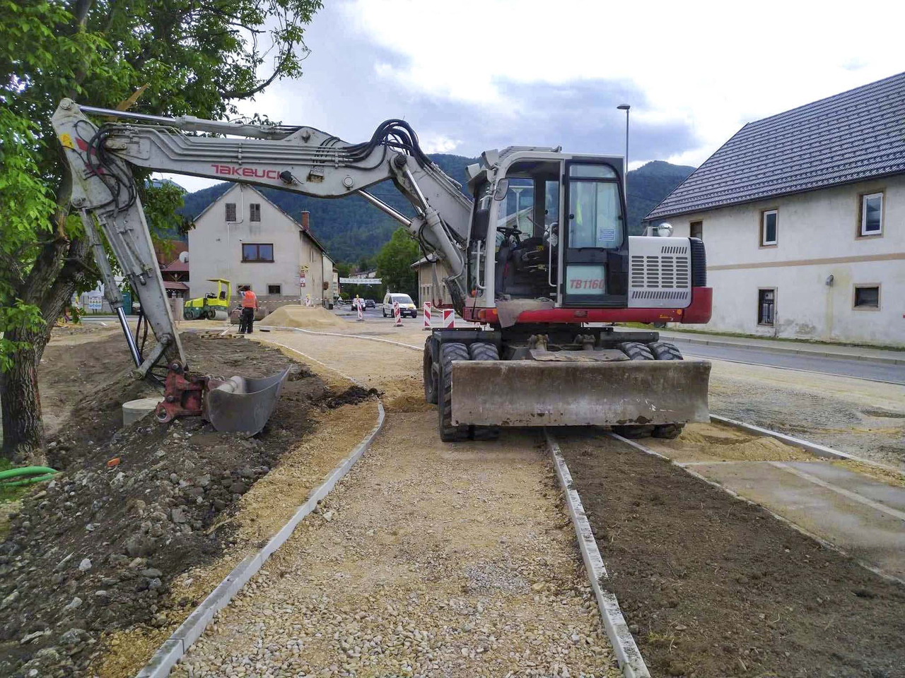 Takeuchi TB1160W - Колісний екскаватор: фото 1 Takeuchi TB1160W - Колісний екскаватор: фото 1