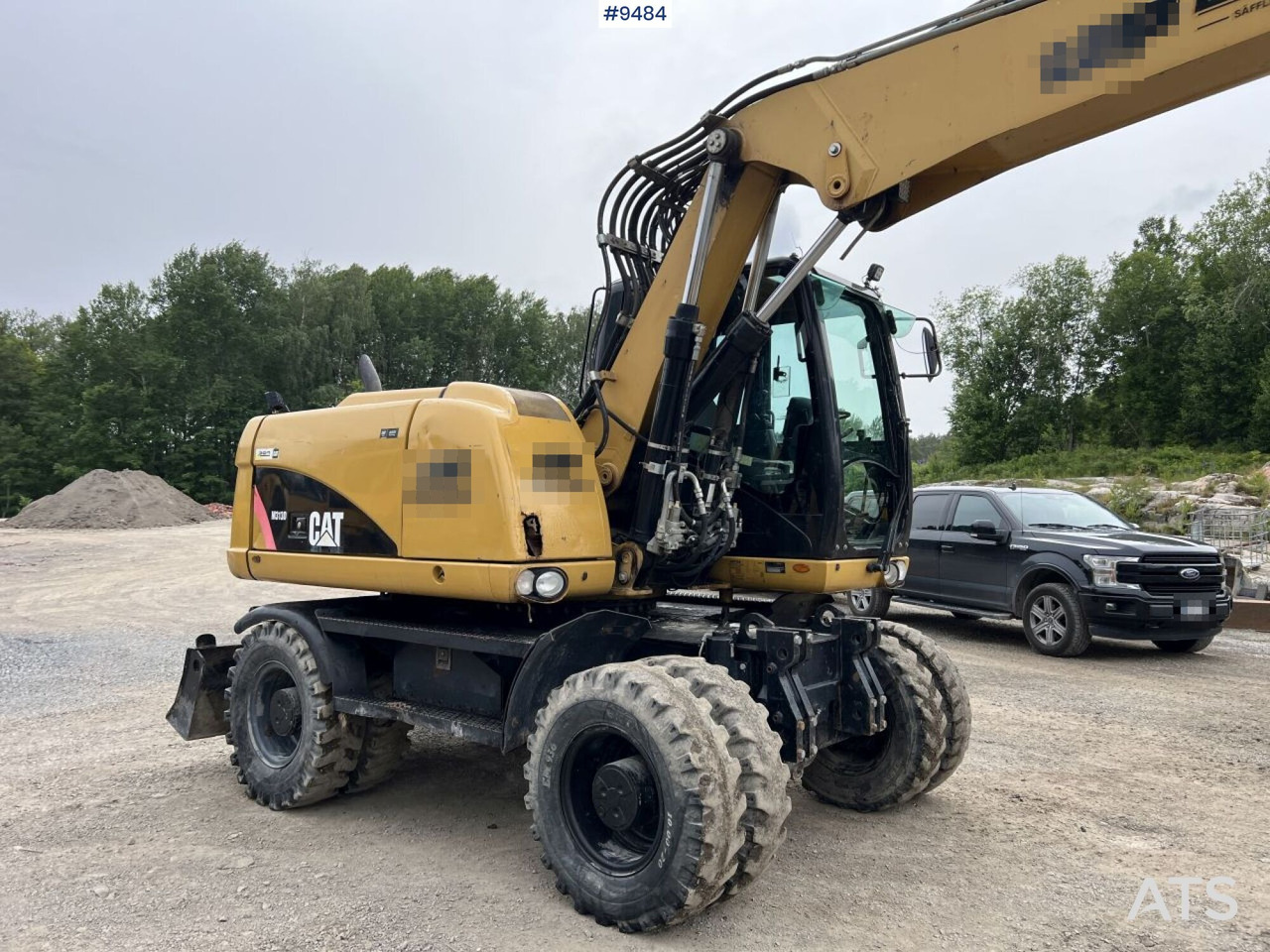 Колісний екскаватор CAT M313D with tipping wagon and attachments (VIDEO): фото 11
