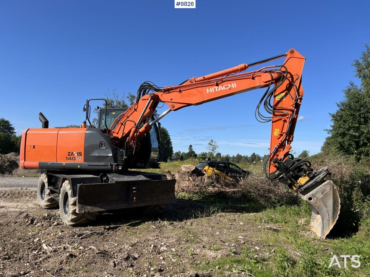 Hitachi ZX140 W-5B with rotor and planer bucket - Колісний екскаватор: фото 1 Hitachi ZX140 W-5B with rotor and planer bucket - Колісний екскаватор: фото 1