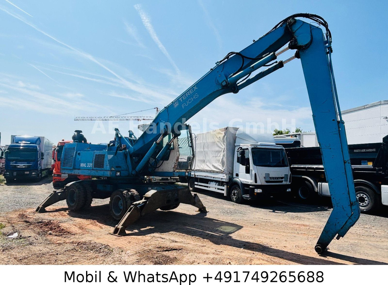 Terex MHL 331 Umschlagbagger - Колісний екскаватор: фото 1 Terex MHL 331 Umschlagbagger - Колісний екскаватор: фото 1