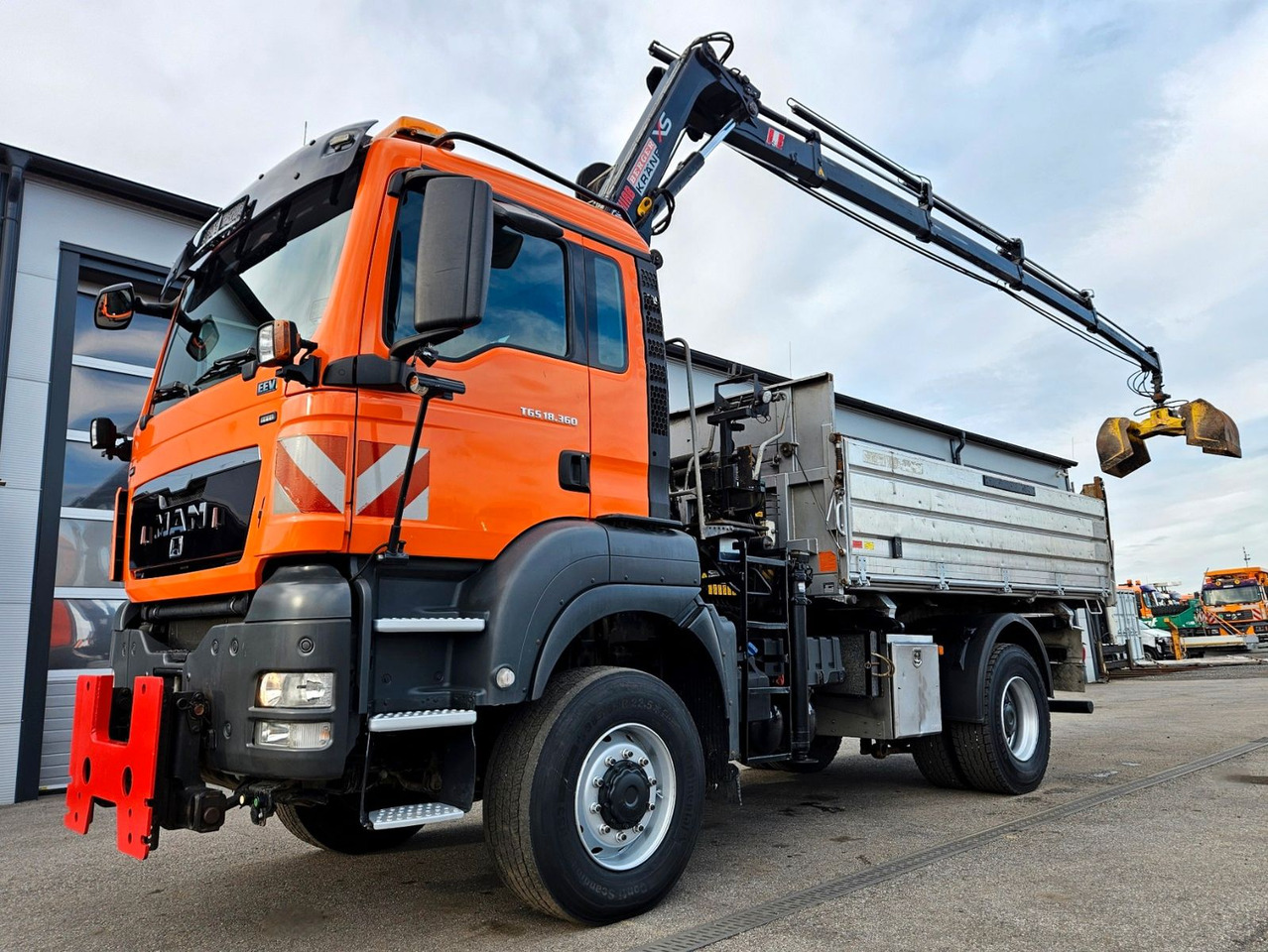 MAN TGS 18.360 4x4 BL HIAB Funk Kran Euro5 - Самоскид вантажівка, Вантажівка з маніпулятором: фото 1 MAN TGS 18.360 4x4 BL HIAB Funk Kran Euro5 - Самоскид вантажівка, Вантажівка з маніпулятором: фото 1