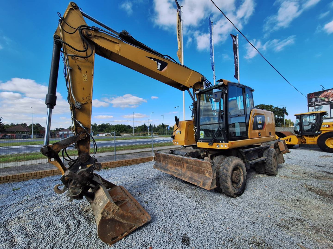 CAT M318F - Колісний екскаватор: фото 1 CAT M318F - Колісний екскаватор: фото 1