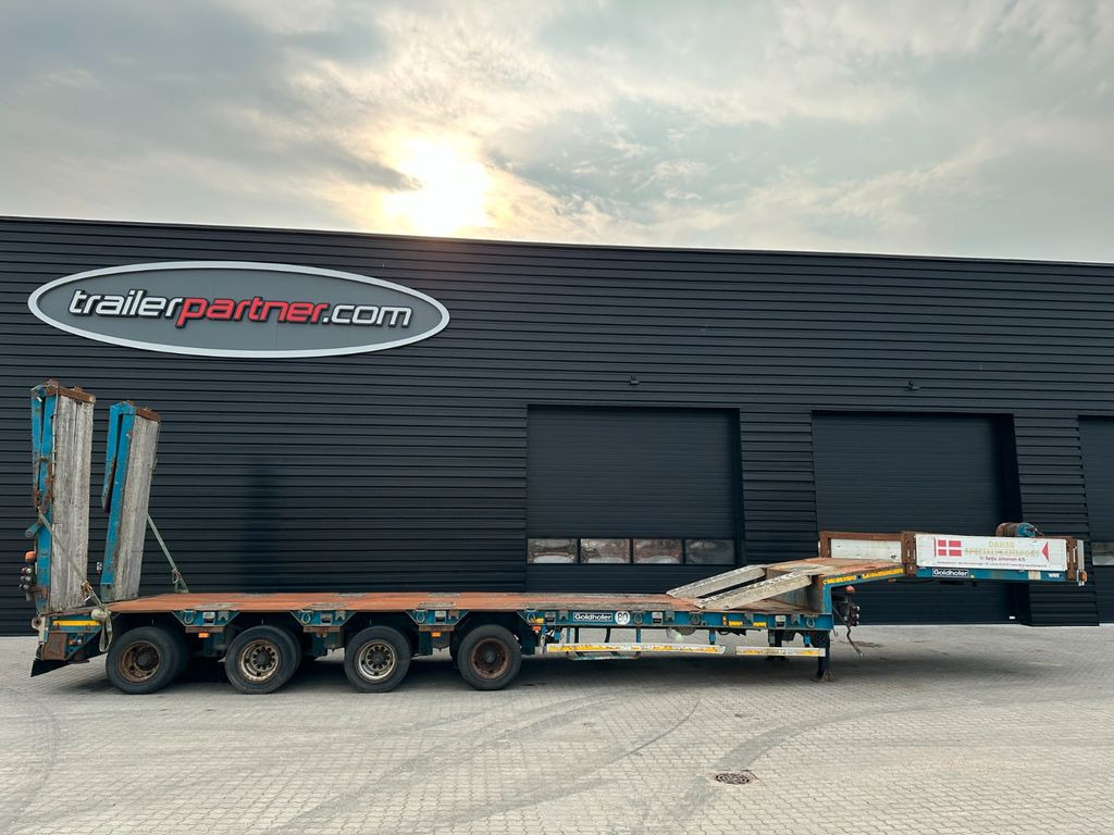 Goldhofer 4 achs tieflader / ausziehbar Goldhofer 4 achs tieflader / ausziehbar - Низькорамна платформа напівпричіп: фото 1 Goldhofer 4 achs tieflader / ausziehbar Goldhofer 4 achs tieflader / ausziehbar - Низькорамна платформа напівпричіп: фото 1