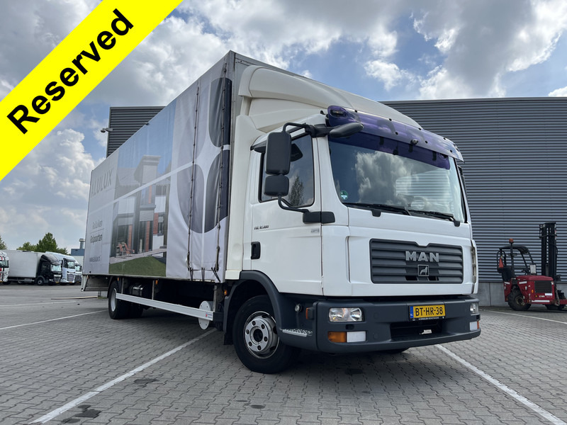 MAN TGL 12.180 Euro 4 / 12 Ton / 781 dkm / Canvas Box / APK TUV 10-25 - Вантажівка з закритим кузовом: фото 1 MAN TGL 12.180 Euro 4 / 12 Ton / 781 dkm / Canvas Box / APK TUV 10-25 - Вантажівка з закритим кузовом: фото 1