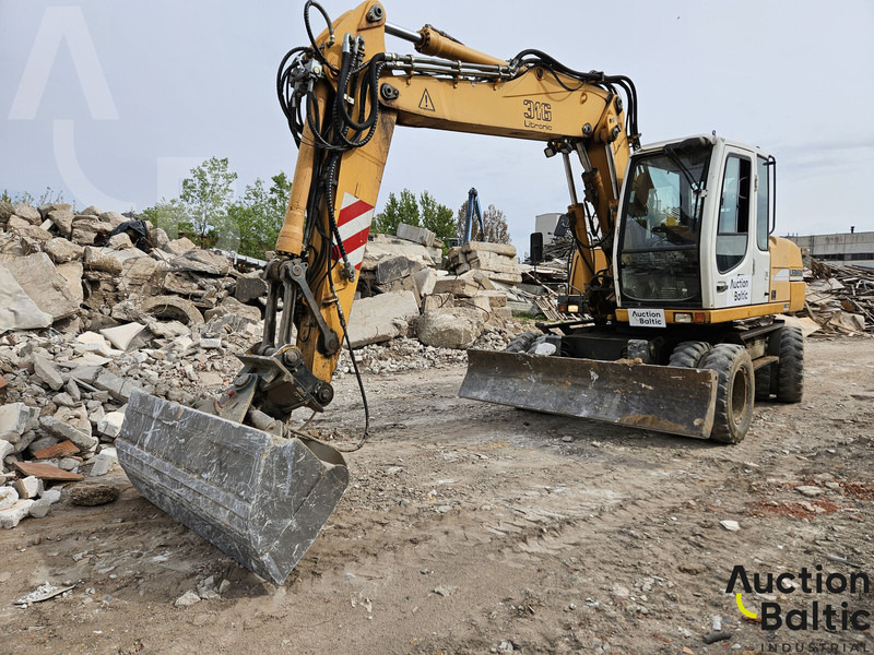Liebherr A 316 Litronic - Колісний екскаватор: фото 1 Liebherr A 316 Litronic - Колісний екскаватор: фото 1