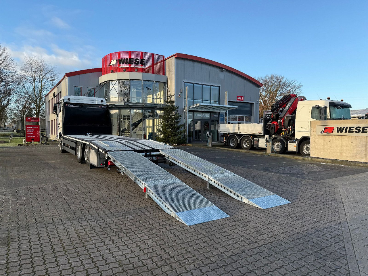 MAN Baumaschinen- Arbeitsbühnentransporter Rampen - Бортова вантажівка/ Платформа: фото 1 MAN Baumaschinen- Arbeitsbühnentransporter Rampen - Бортова вантажівка/ Платформа: фото 1