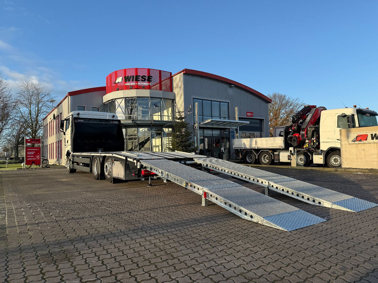 MAN Baumaschinen- Arbeitsbühnentransporter Rampen - Евакуатор: фото 3 MAN Baumaschinen- Arbeitsbühnentransporter Rampen - Евакуатор: фото 3