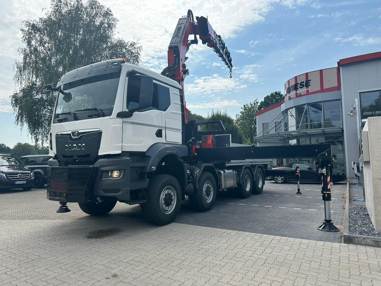 MAN TGS 41.520 8x8 mit Fassi Ladekran F710RA.2.26 - Бортова вантажівка/ Платформа: фото 2 MAN TGS 41.520 8x8 mit Fassi Ladekran F710RA.2.26 - Бортова вантажівка/ Платформа: фото 2