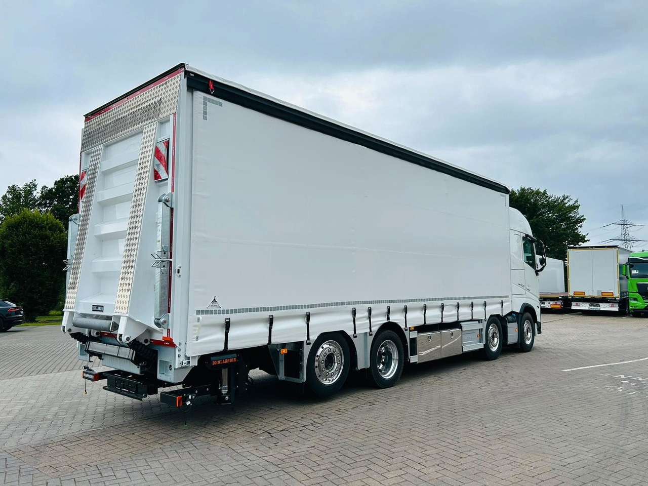 Volvo FH 500 Gabelstaplertransporter LBW Dhollandia 9t - Тентована вантажівка: фото 2 Volvo FH 500 Gabelstaplertransporter LBW Dhollandia 9t - Тентована вантажівка: фото 2