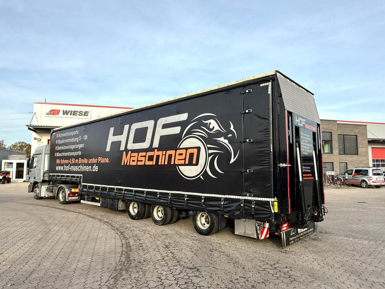 Wiese 3-Achs Stufen Sattel mit Auffahrrampe 25T - Низькорамна платформа напівпричіп: фото 1 Wiese 3-Achs Stufen Sattel mit Auffahrrampe 25T - Низькорамна платформа напівпричіп: фото 1