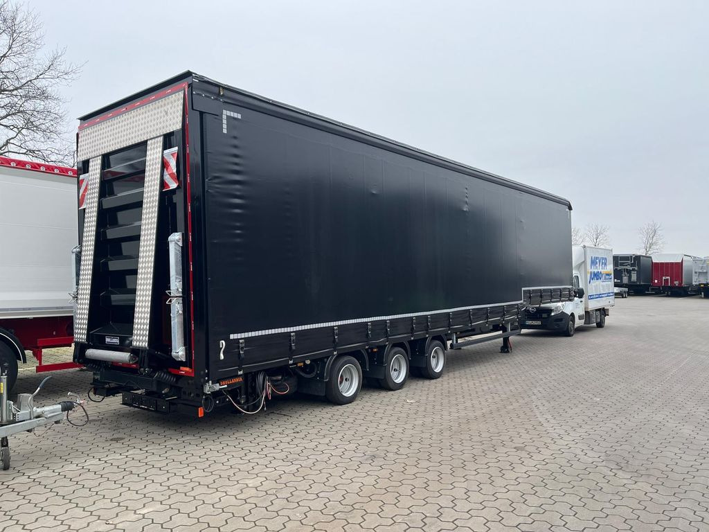 Wiese Gabelstaplertransporter Mega mit Rampen - Низькорамна платформа напівпричіп: фото 1 Wiese Gabelstaplertransporter Mega mit Rampen - Низькорамна платформа напівпричіп: фото 1