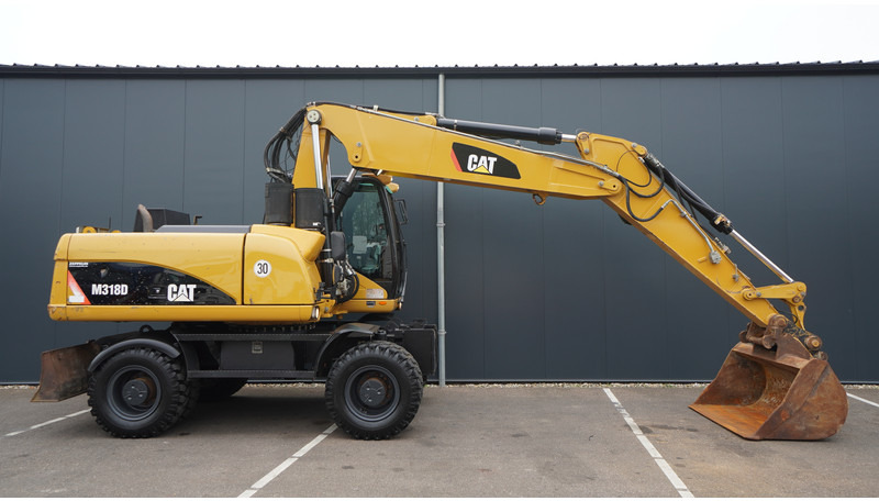 Caterpillar M318D 4X4 WHEELED EXCAVATOR - Будівельна техніка: фото 2 Caterpillar M318D 4X4 WHEELED EXCAVATOR - Будівельна техніка: фото 2