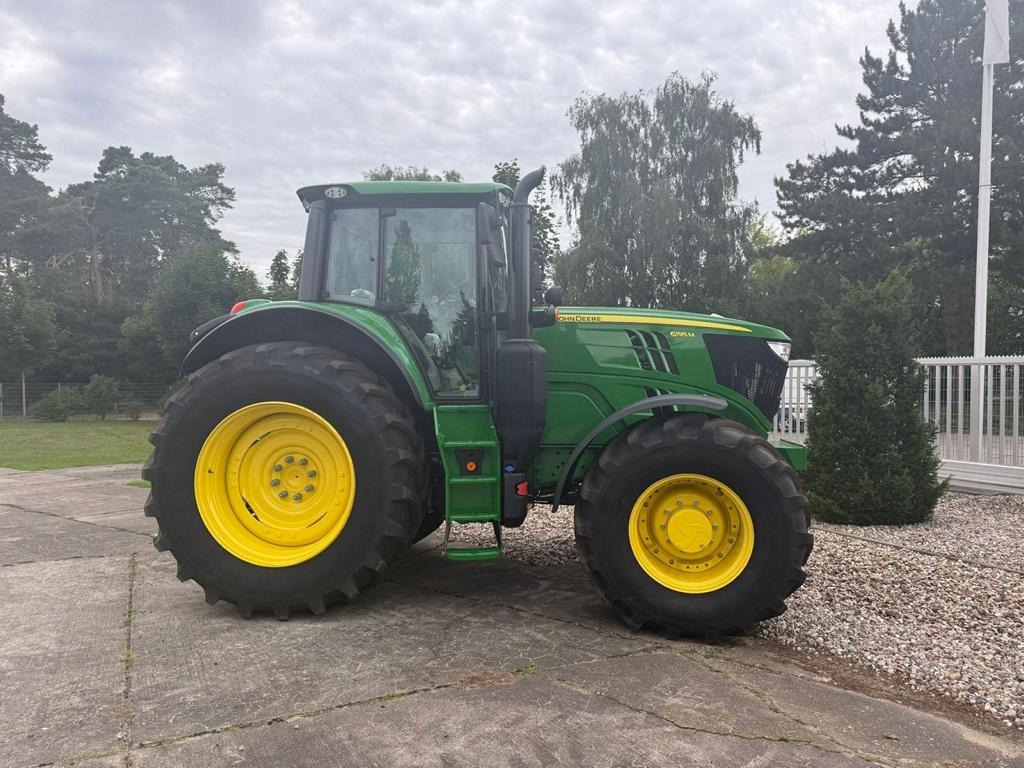 John Deere TRAKTOR 6195M MIT KABINE - Трактор: фото 1 John Deere TRAKTOR 6195M MIT KABINE - Трактор: фото 1