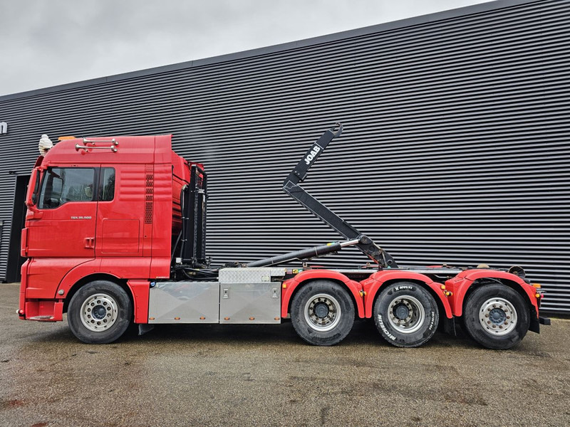 MAN TGX 35.500 / 8x4-4 / HOOKLIFT / ABROLL-KIPPER - Гаковий мультиліфт вантажівка: фото 2 MAN TGX 35.500 / 8x4-4 / HOOKLIFT / ABROLL-KIPPER - Гаковий мультиліфт вантажівка: фото 2