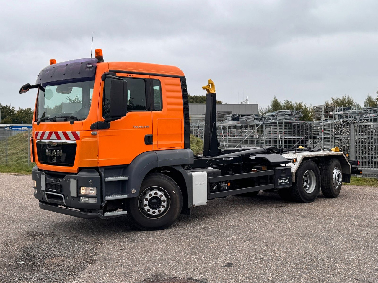MAN 26.40 6X2 Meiller RK 20.70  mit Funk - Гаковий мультиліфт вантажівка: фото 1 MAN 26.40 6X2 Meiller RK 20.70  mit Funk - Гаковий мультиліфт вантажівка: фото 1