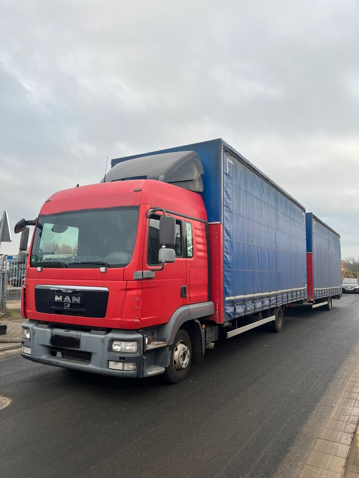 MAN 8.220 4X2 Pritschenwagen - Тентована вантажівка: фото 1 MAN 8.220 4X2 Pritschenwagen - Тентована вантажівка: фото 1
