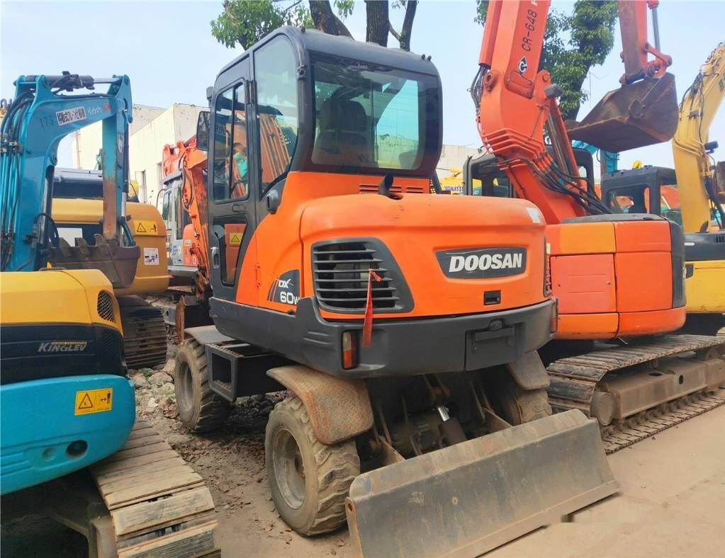 Doosan DX60 W - Колісний екскаватор: фото 1 Doosan DX60 W - Колісний екскаватор: фото 1