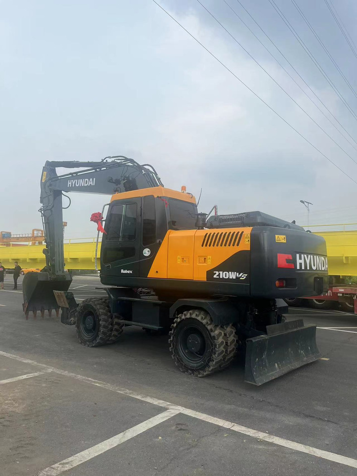 HYUNDAI R210W - Колісний екскаватор: фото 1 HYUNDAI R210W - Колісний екскаватор: фото 1