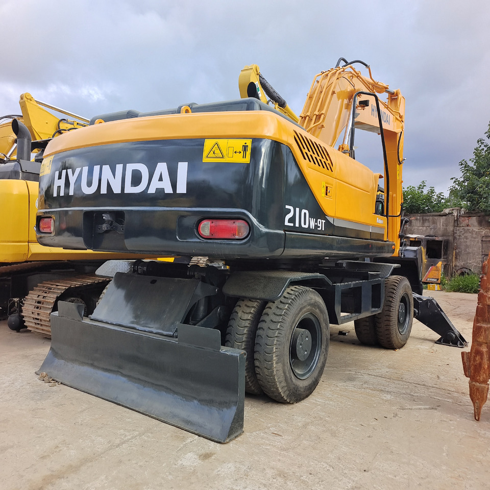 HYUNDAI 210W-9T - Колісний екскаватор: фото 2 HYUNDAI 210W-9T - Колісний екскаватор: фото 2