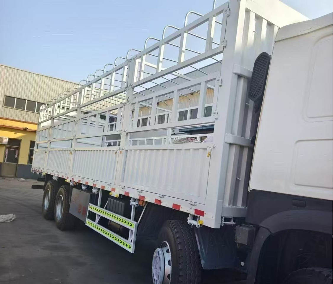 SINOTRUK HOWO 8*4 WITH FENCE 12 WHEELS 371 375 380 400 420 HP TIPPER DUMP TRUCK - Для перевезення худоби вантажівка: фото 5 SINOTRUK HOWO 8*4 WITH FENCE 12 WHEELS 371 375 380 400 420 HP TIPPER DUMP TRUCK - Для перевезення худоби вантажівка: фото 5