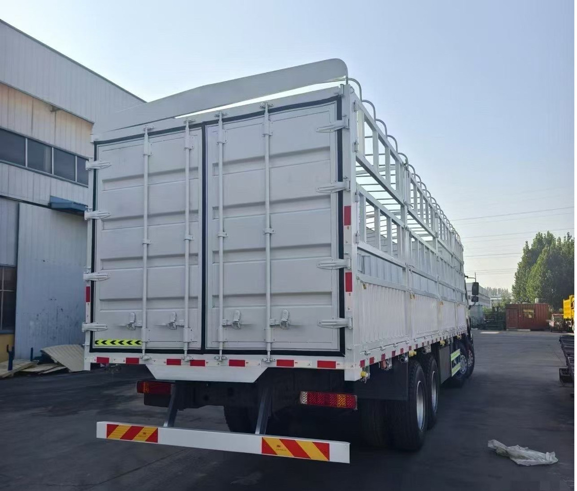 SINOTRUK HOWO 8*4 WITH FENCE 12 WHEELS 371 375 380 400 420 HP TIPPER DUMP TRUCK - Для перевезення худоби вантажівка: фото 3 SINOTRUK HOWO 8*4 WITH FENCE 12 WHEELS 371 375 380 400 420 HP TIPPER DUMP TRUCK - Для перевезення худоби вантажівка: фото 3