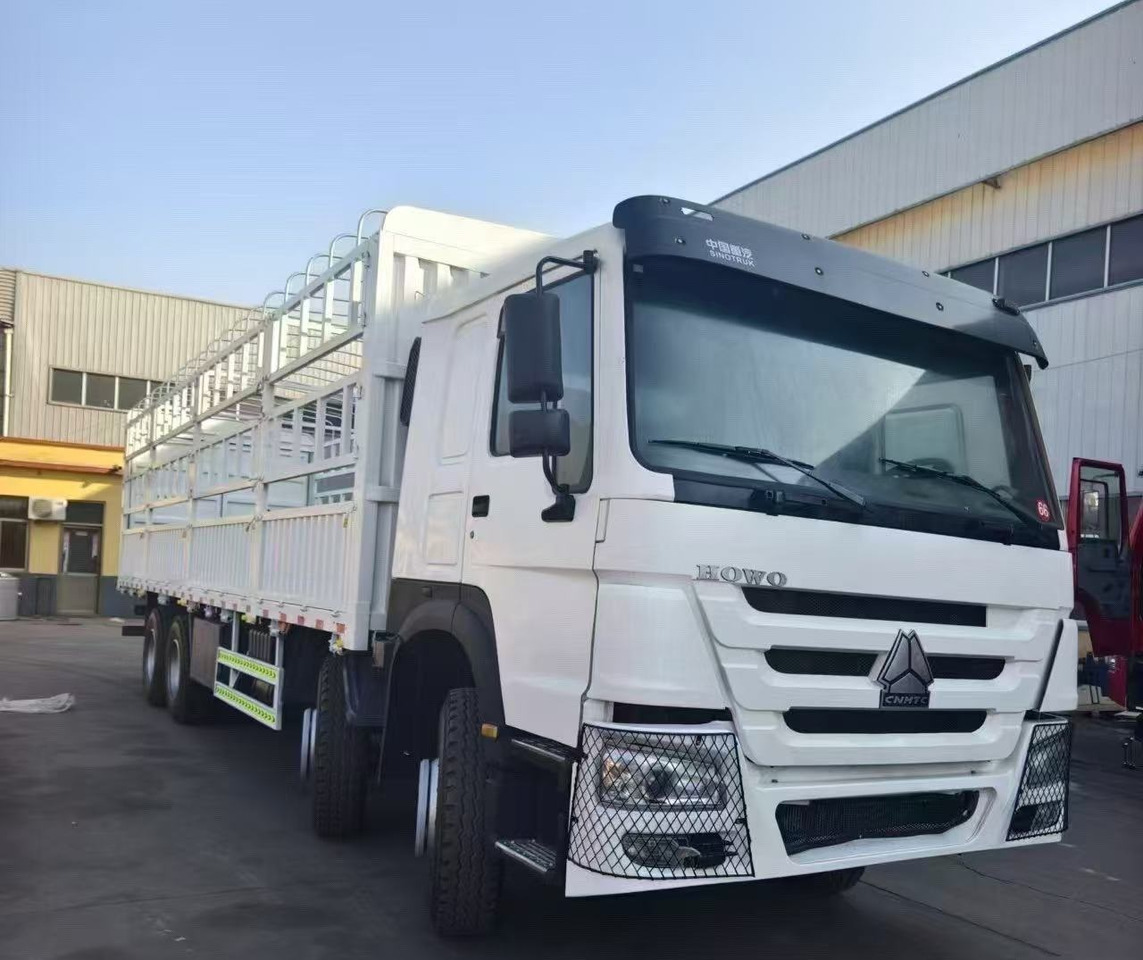 SINOTRUK HOWO 8*4 WITH FENCE 12 WHEELS 371 375 380 400 420 HP TIPPER DUMP TRUCK - Для перевезення худоби вантажівка: фото 4 SINOTRUK HOWO 8*4 WITH FENCE 12 WHEELS 371 375 380 400 420 HP TIPPER DUMP TRUCK - Для перевезення худоби вантажівка: фото 4