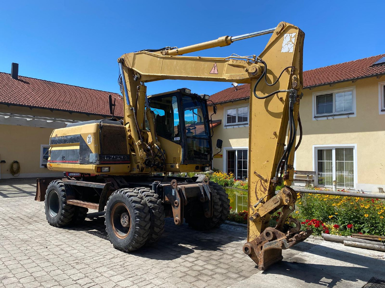 Caterpillar M 312 - Колісний екскаватор: фото 1 Caterpillar M 312 - Колісний екскаватор: фото 1