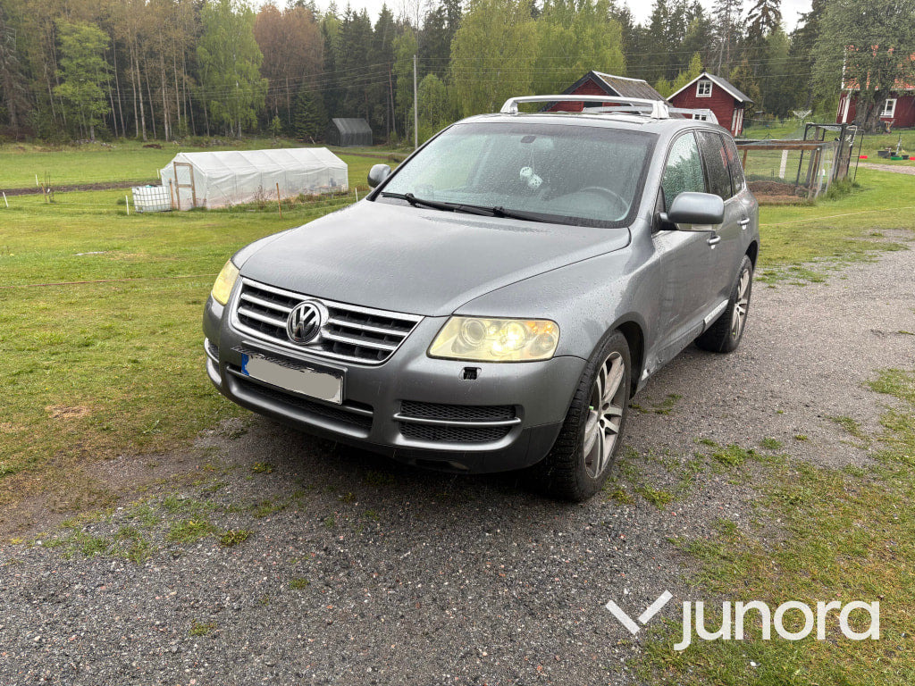 EPA / A-Traktor Volkswagen Touareg V8 - Легковий автомобіль: фото 1 EPA / A-Traktor Volkswagen Touareg V8 - Легковий автомобіль: фото 1