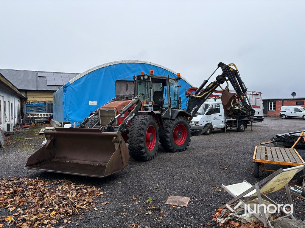 Grävlastare - Huddig, 860 - Екскаватор-навантажувач: фото 1 Grävlastare - Huddig, 860 - Екскаватор-навантажувач: фото 1