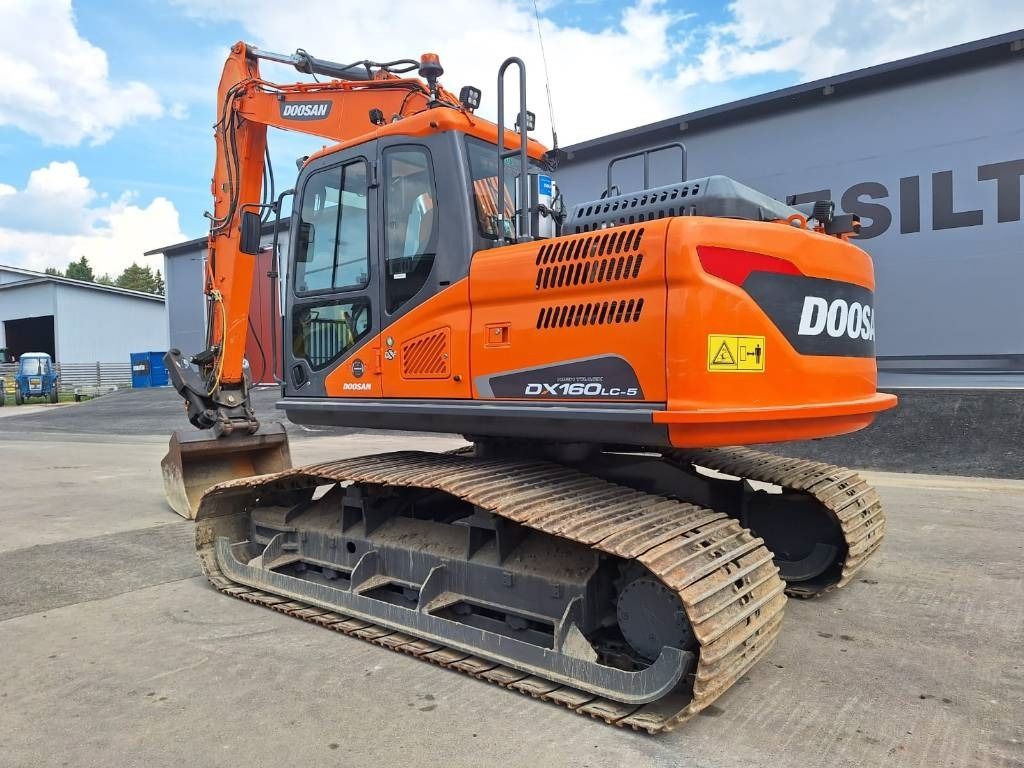 Doosan DX160LCH-5 METSÄMALLI KALLISTAJALLA - Гусеничний екскаватор: фото 2 Doosan DX160LCH-5 METSÄMALLI KALLISTAJALLA - Гусеничний екскаватор: фото 2