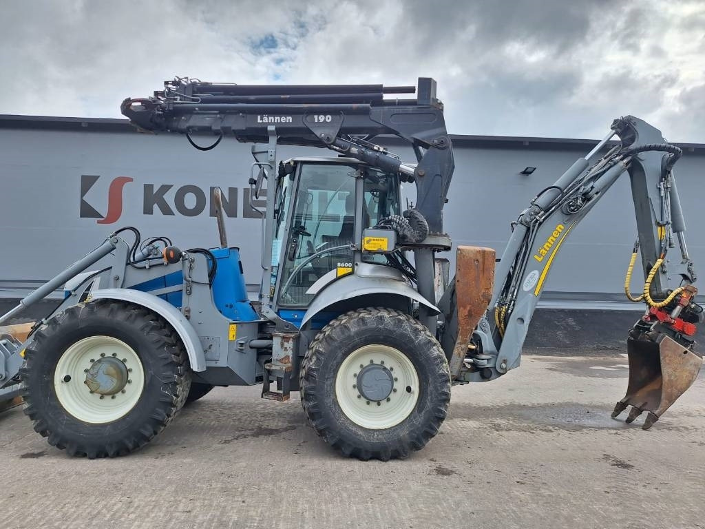 Lännen 8600G NOSTIN, HENKILÖKORI, PYÖRITTÄJÄ YM. - Екскаватор-навантажувач: фото 4 Lännen 8600G NOSTIN, HENKILÖKORI, PYÖRITTÄJÄ YM. - Екскаватор-навантажувач: фото 4