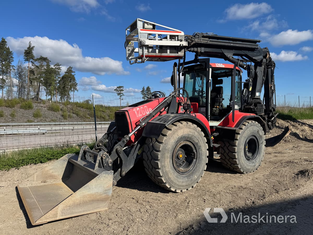 Grävlastare Huddig 1260B - Екскаватор-навантажувач: фото 1 Grävlastare Huddig 1260B - Екскаватор-навантажувач: фото 1