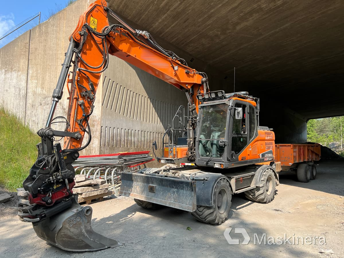 Hjulgrävare Doosan DX160W med tillbehör - Гусеничний екскаватор: фото 1 Hjulgrävare Doosan DX160W med tillbehör - Гусеничний екскаватор: фото 1