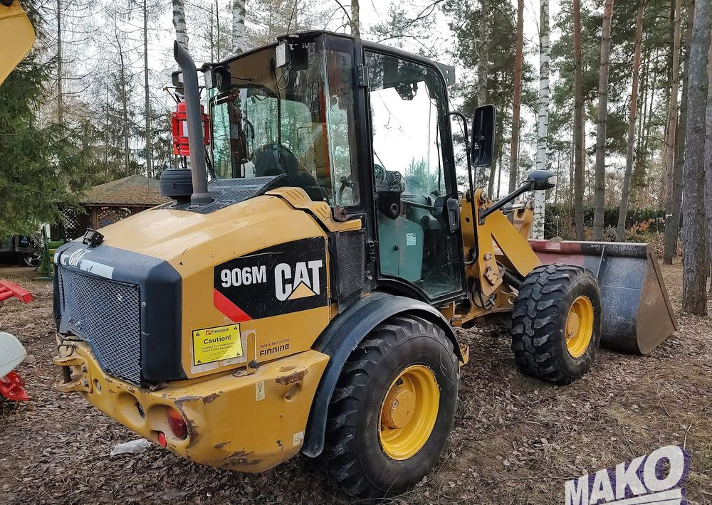 Caterpillar 906M - Колісний навантажувач: фото 1 Caterpillar 906M - Колісний навантажувач: фото 1