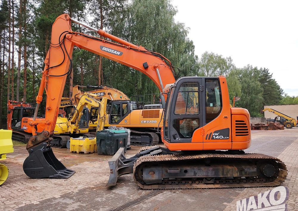 Doosan DX140LCR - Гусеничний екскаватор: фото 1 Doosan DX140LCR - Гусеничний екскаватор: фото 1