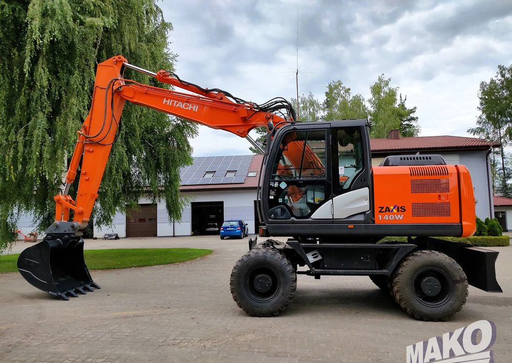 Hitachi ZX 140 - Колісний екскаватор: фото 1 Hitachi ZX 140 - Колісний екскаватор: фото 1