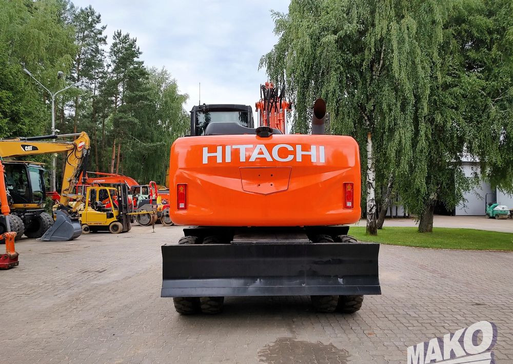Hitachi ZX 140 - Колісний екскаватор: фото 3 Hitachi ZX 140 - Колісний екскаватор: фото 3