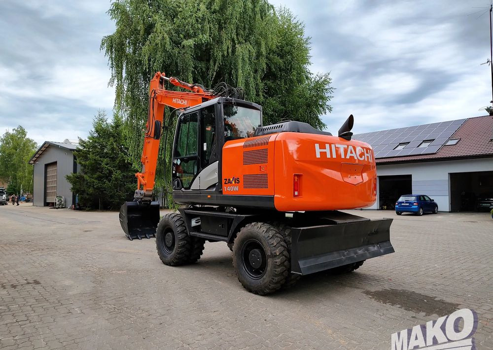 Hitachi ZX 140 - Колісний екскаватор: фото 2 Hitachi ZX 140 - Колісний екскаватор: фото 2